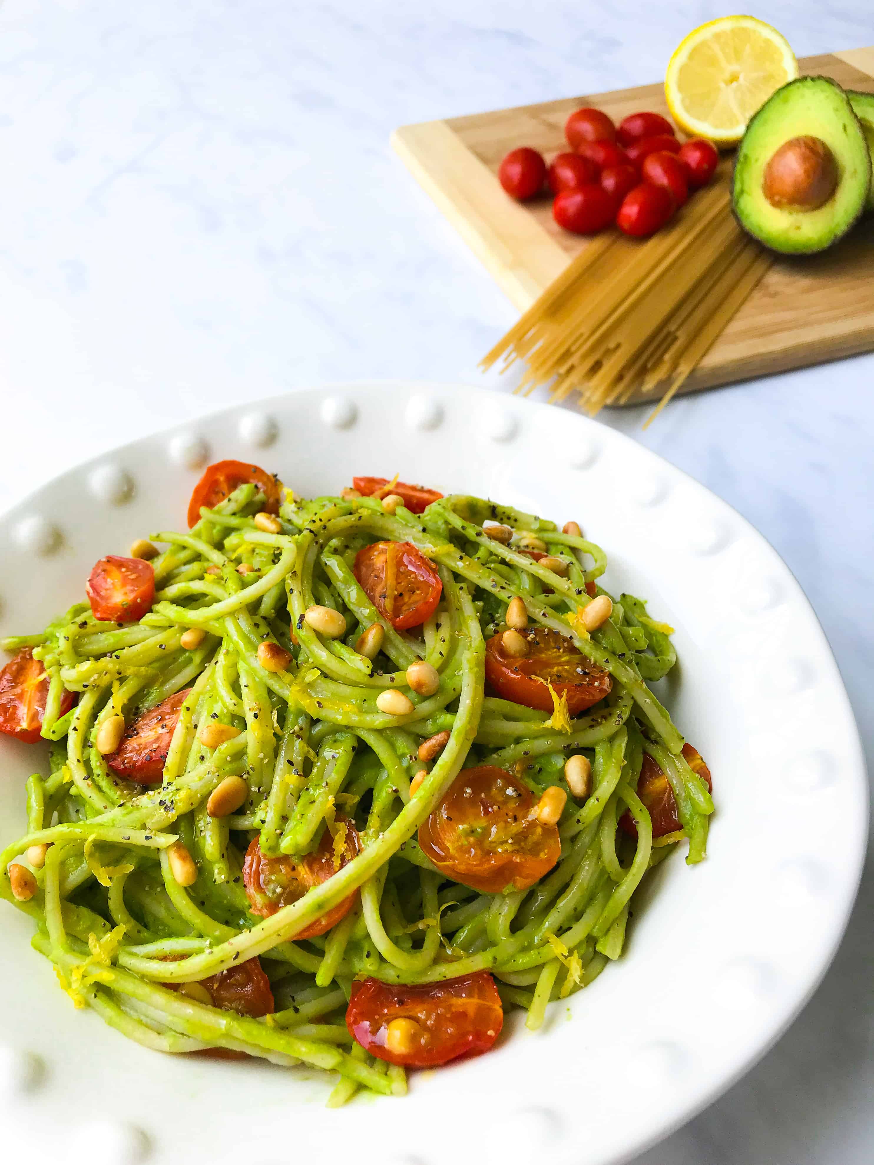 Avocado Pesto Pasta with Roasted Tomatoes and Pinenuts I Georgie Eats