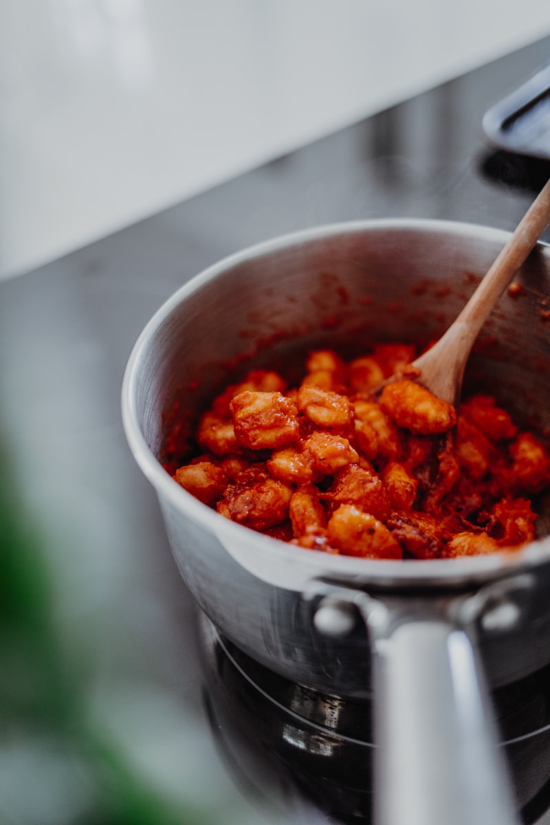 Sundried Tomato & Roasted Red Pepper Gnocchi in a saucepan I Georgie Eats