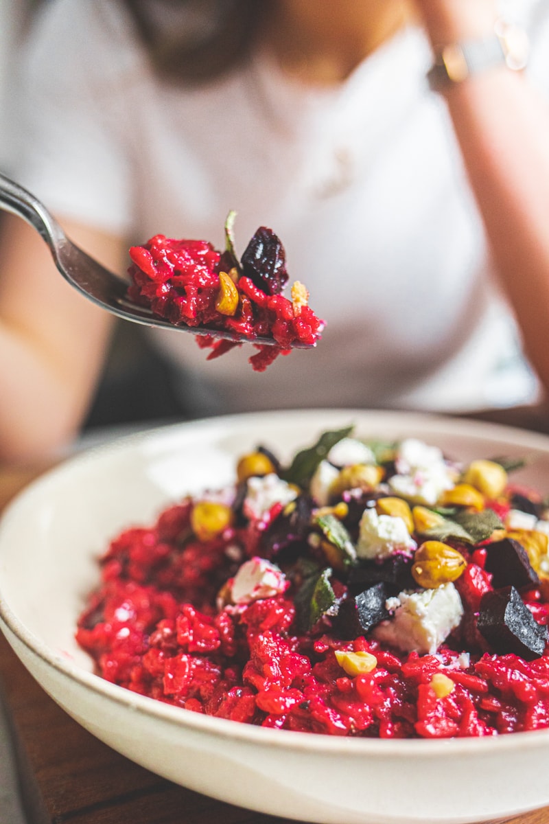A forkful of Beetroot Risotto with Crispy Sage and Toasted Hazelnuts - Georgie Eats