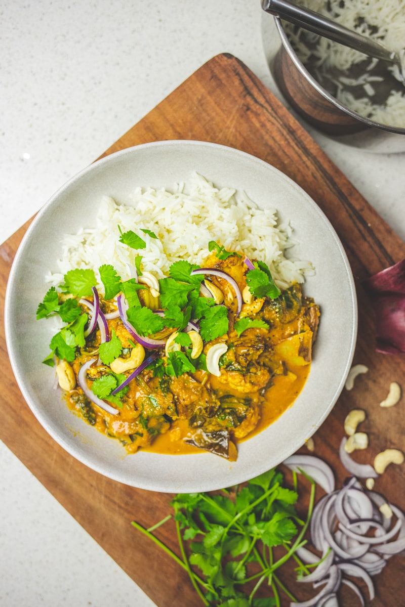 Close up of The Best Vegan Roasted Cauliflower Curry - Georgie Eats