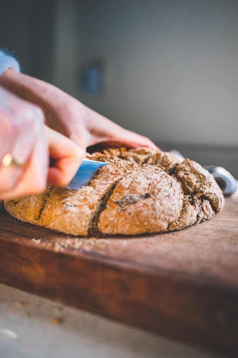 Cutting the Rosemary & Sun-Dried Tomato Soda Bread - Georgie Eats