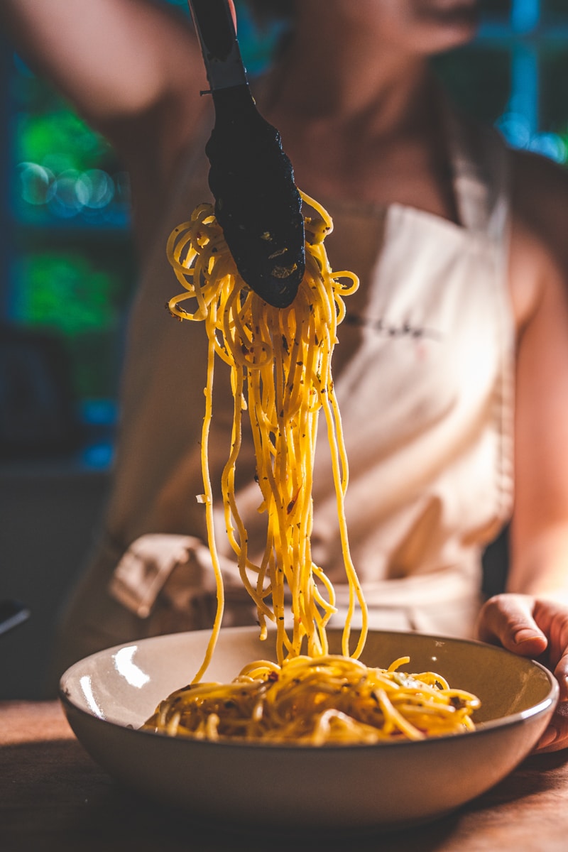 plating the Broad Bean Spaghetti with Garlic, Chilli & Lemon - Georgie Eats