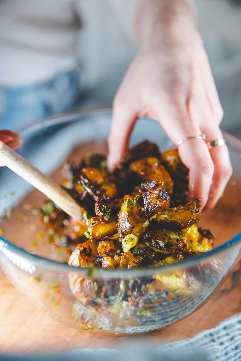 Mixing the Crispy Chimichurri Potatoes - Georgie Eats