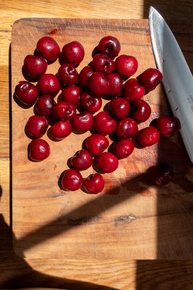 cherries on a board