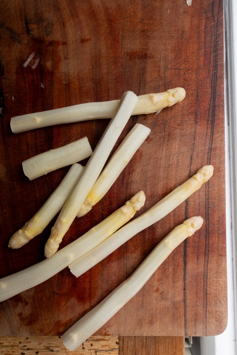 White Asparagus On A Wooden Chopping Board - Georgie Mullen